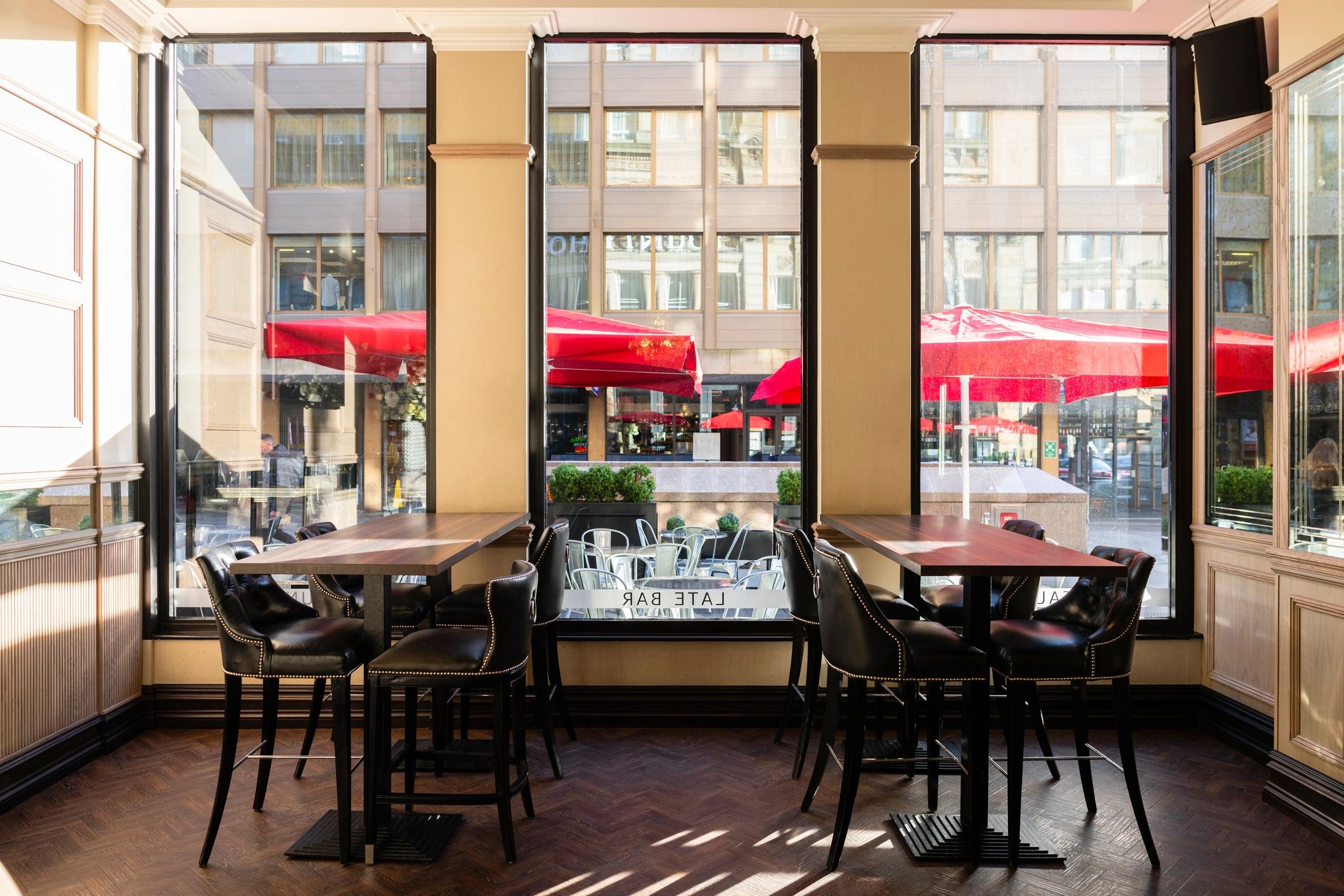 Restaurant tables and chairs in an interior setting